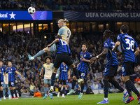 Erling Haaland #9 of Manchester City F.C. heads the ball during the UEFA Champions League League Stage match between Manchester City and Foo...