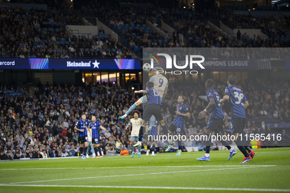 Erling Haaland #9 of Manchester City F.C. heads the ball during the UEFA Champions League League Stage match between Manchester City and Foo...