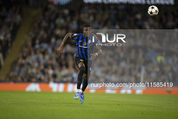 Yann Aurel Bisseck #31 of Inter Milan during the UEFA Champions League League Stage match between Manchester City and Football Club Internaz...