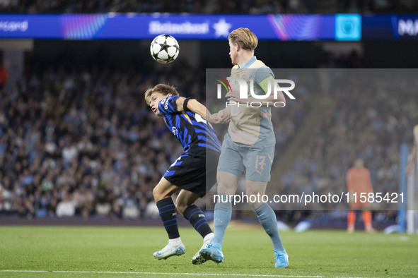 Nicolo Barella #23 of Inter Milan possesses the ball during the UEFA Champions League League Stage match between Manchester City and Footbal...