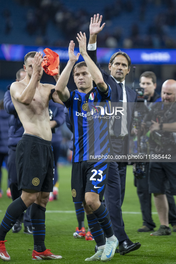 Nicolo Barella #23 of Inter Milan salutes the fans at full time during the UEFA Champions League League Stage match between Manchester City...