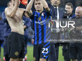 Nicolo Barella #23 of Inter Milan salutes the fans at full time during the UEFA Champions League League Stage match between Manchester City...