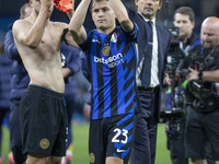 Nicolo Barella #23 of Inter Milan salutes the fans at full time during the UEFA Champions League League Stage match between Manchester City...