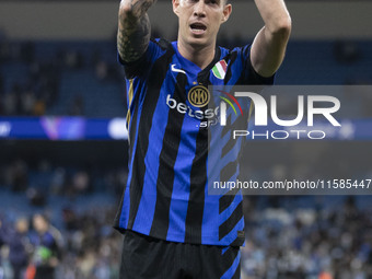 Alessandro Bastoni #95 of Inter Milan at full time during the UEFA Champions League League Stage match between Manchester City and Football...