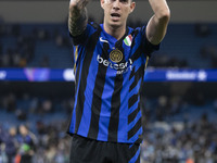 Alessandro Bastoni #95 of Inter Milan at full time during the UEFA Champions League League Stage match between Manchester City and Football...