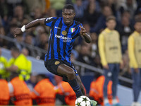 Marcus Thuram #9 of Inter Milan possesses the ball during the UEFA Champions League League Stage match between Manchester City and Football...