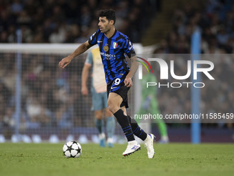 Mehdi Taremi #99 of Inter Milan during the UEFA Champions League group stage match between Manchester City and Football Club Internazionale...