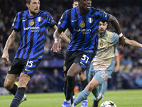 Yann Aurel Bisseck #31 of Inter Milan is in action during the UEFA Champions League League Stage match between Manchester City and Football...