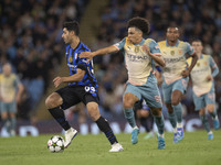 Mehdi Taremi #99 of Inter Milan is in action during the UEFA Champions League Group Stage match between Manchester City and Football Club In...