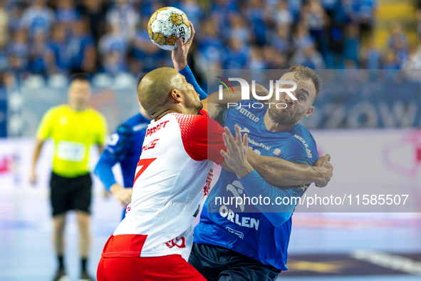 Andre Gomes and Zoltan Szita are playing during the  EHF Champions League Men match between  Orlen Wisla Plock and Dinamo Bucuresti in Plock...