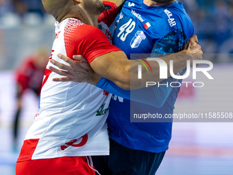 Andre Gomes and  Zoltan Szita  are playing during the  EHF Champions League Men match between  Orlen Wisla Plock and Dinamo Bucuresti in Plo...