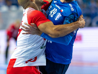 Andre Gomes and  Zoltan Szita  are playing during the  EHF Champions League Men match between  Orlen Wisla Plock and Dinamo Bucuresti in Plo...