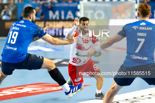 Leon Susnja and  Yoav Lumbroso are  playing during the  EHF Champions League Men match between  Orlen Wisla Plock and Dinamo Bucuresti in Pl...