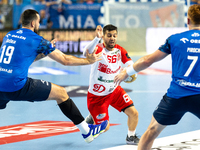 Leon Susnja and  Yoav Lumbroso are  playing during the  EHF Champions League Men match between  Orlen Wisla Plock and Dinamo Bucuresti in Pl...