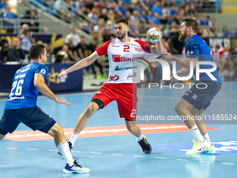 Przemyslaw Krajewski, Branko Vujovic and Mirsad Terzic are  playing during the  EHF Champions League Men match between  Orlen Wisla Plock an...