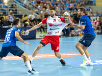 Przemyslaw Krajewski, Branko Vujovic and Mirsad Terzic are  playing during the  EHF Champions League Men match between  Orlen Wisla Plock an...