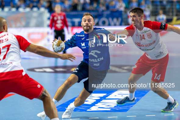 Zoltan Szita and Frederik Ladefoged Blazejewicz are playing during the  EHF Champions League Men match between  Orlen Wisla Plock and Dinamo...