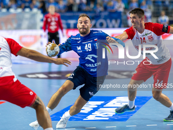 Zoltan Szita and Frederik Ladefoged Blazejewicz are playing during the  EHF Champions League Men match between  Orlen Wisla Plock and Dinamo...