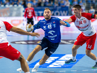 Zoltan Szita and Frederik Ladefoged Blazejewicz are playing during the  EHF Champions League Men match between  Orlen Wisla Plock and Dinamo...