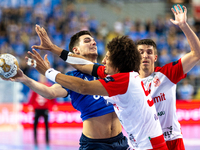 Gergo Fazekas and Ali Ismail Mohamed Zeinelabedin Ali are playing during the  EHF Champions League Men match between  Orlen Wisla Plock and...