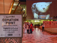 People visit the installation of teddy bears titled ''Echo of Lost Innocence'' at the Barahat Mashaireb open-air gallery to draw attention t...