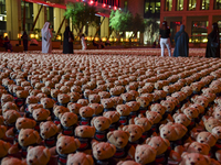 People visit the installation of teddy bears titled ''Echo of Lost Innocence'' at the Barahat Mashaireb open-air gallery to draw attention t...