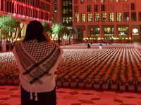 People visit the installation of teddy bears titled ''Echo of Lost Innocence'' at the Barahat Mashaireb open-air gallery to draw attention t...