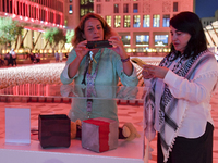 People visit the installation of teddy bears titled ''Echo of Lost Innocence'' at the Barahat Mashaireb open-air gallery to draw attention t...