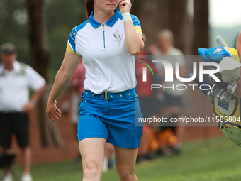 GAINESVILLE, VIRGINIA - SEPTEMBER 13: Leona Maguire of Team Europe walks on the second hole during Fourball Matches on Day One of the Solhei...