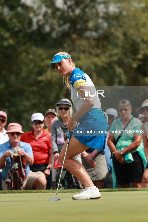 GAINESVILLE, VIRGINIA - SEPTEMBER 13: Charley Hull of Team Europe reacts to her putt on the third green during Fourball Matches on Day One o...