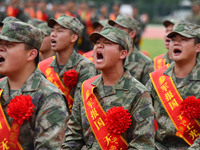 Young conscripts attend a send-off ceremony for new recruits in Fuyang, China, on September 19, 2024. (