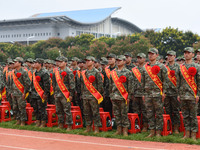 Young conscripts attend a send-off ceremony for new recruits in Fuyang, China, on September 19, 2024. (