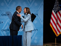 Rep. Adriano Espaillat (D-NY) hugs Vice President and Democratic presidential nominee Kamala Harris after introducing her to deliver remarks...