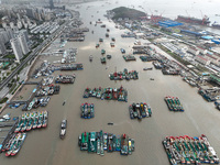 A large number of fishing boats moor at Shenjiamen Fishing Port to take shelter from Typhoon Pulasan in Zhoushan, China, on September 19, 20...