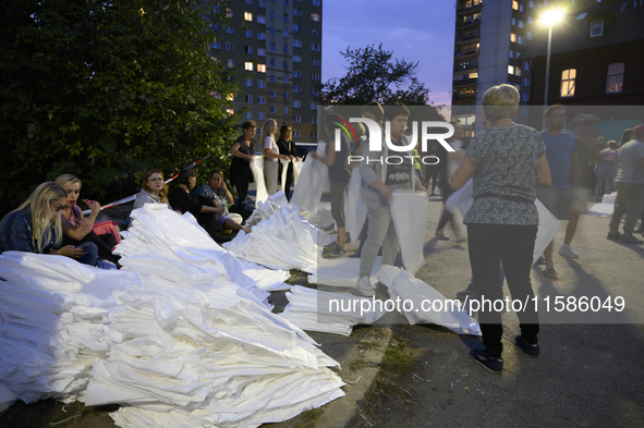 People prepare sandbags to tackle the ongoing high water level throughout the region in Olawa, near Wroclaw, Poland, on September 18, 2024....