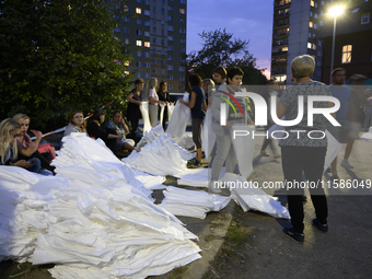 People prepare sandbags to tackle the ongoing high water level throughout the region in Olawa, near Wroclaw, Poland, on September 18, 2024....