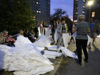 People prepare sandbags to tackle the ongoing high water level throughout the region in Olawa, near Wroclaw, Poland, on September 18, 2024....