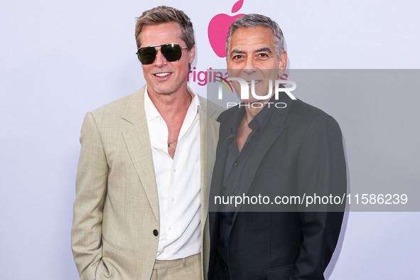 Brad Pitt and George Clooney arrive at the Los Angeles Premiere Of Apple TV+'s 'Wolfs' held at the TCL Chinese Theatre IMAX on September 18,...