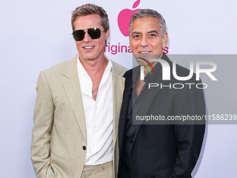 Brad Pitt and George Clooney arrive at the Los Angeles Premiere Of Apple TV+'s 'Wolfs' held at the TCL Chinese Theatre IMAX on September 18,...