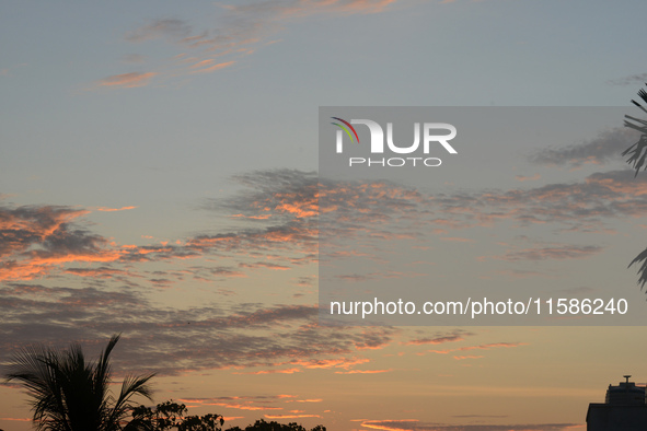 The Sun rises in the early morning sky in Siliguri, India, on September 19, 2024. 