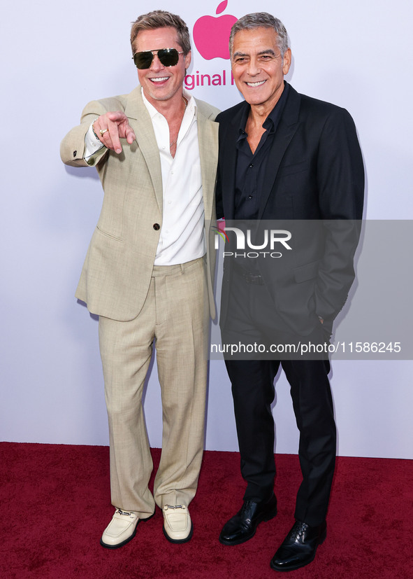 Brad Pitt and George Clooney arrive at the Los Angeles Premiere Of Apple TV+'s 'Wolfs' held at the TCL Chinese Theatre IMAX on September 18,...