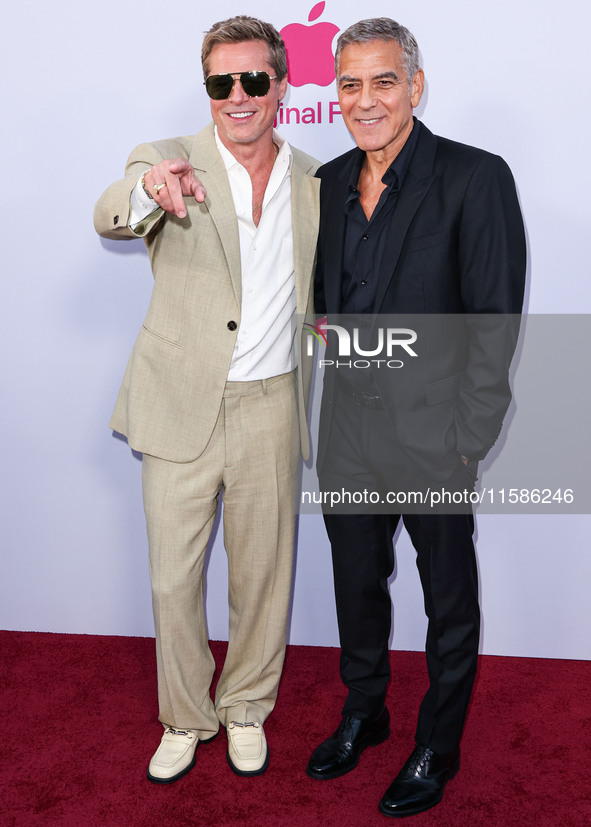 Brad Pitt and George Clooney arrive at the Los Angeles Premiere Of Apple TV+'s 'Wolfs' held at the TCL Chinese Theatre IMAX on September 18,...