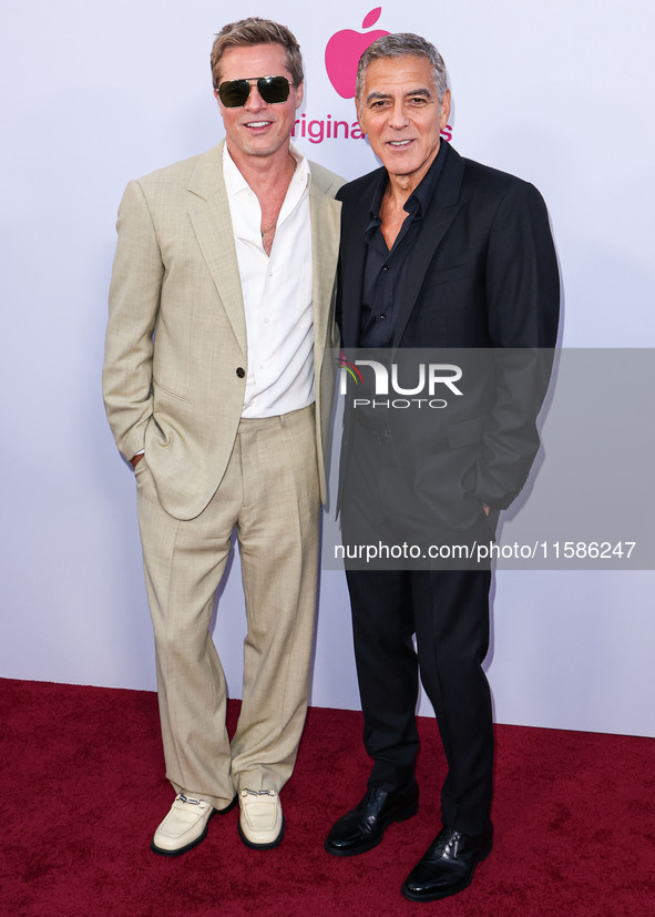 Brad Pitt and George Clooney arrive at the Los Angeles Premiere Of Apple TV+'s 'Wolfs' held at the TCL Chinese Theatre IMAX on September 18,...