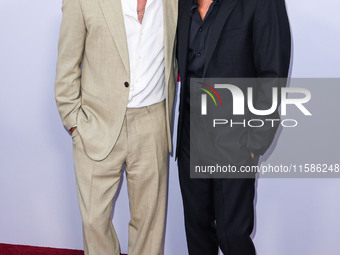 Brad Pitt and George Clooney arrive at the Los Angeles Premiere Of Apple TV+'s 'Wolfs' held at the TCL Chinese Theatre IMAX on September 18,...