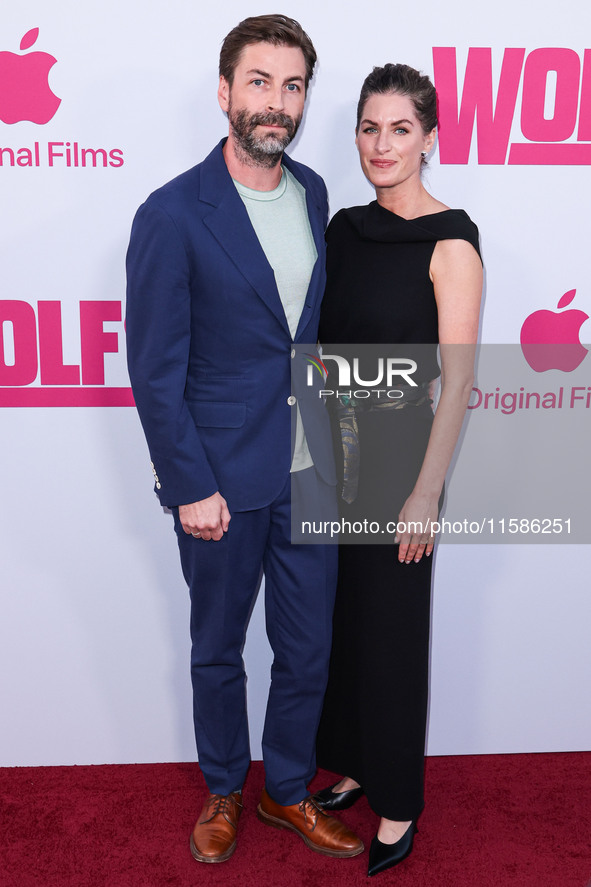 Jon Watts and Dianne McGunigle arrive at the Los Angeles Premiere Of Apple TV+'s 'Wolfs' held at the TCL Chinese Theatre IMAX on September 1...