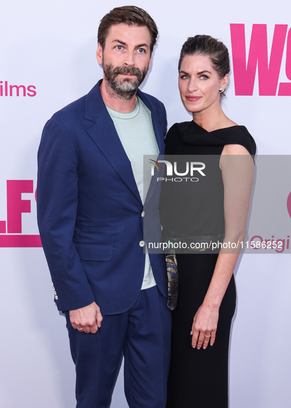 Jon Watts and Dianne McGunigle arrive at the Los Angeles Premiere Of Apple TV+'s 'Wolfs' held at the TCL Chinese Theatre IMAX on September 1...