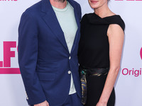 Jon Watts and Dianne McGunigle arrive at the Los Angeles Premiere Of Apple TV+'s 'Wolfs' held at the TCL Chinese Theatre IMAX on September 1...