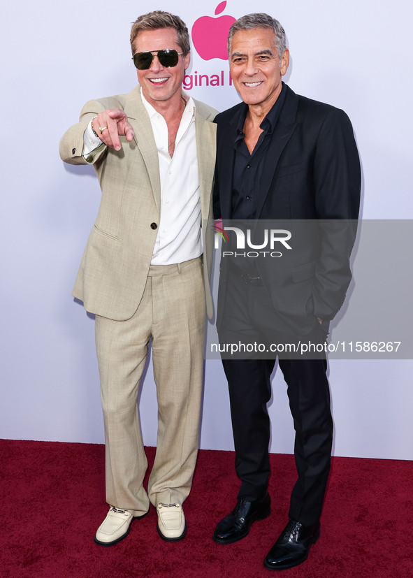 Brad Pitt and George Clooney arrive at the Los Angeles Premiere Of Apple TV+'s 'Wolfs' held at the TCL Chinese Theatre IMAX on September 18,...