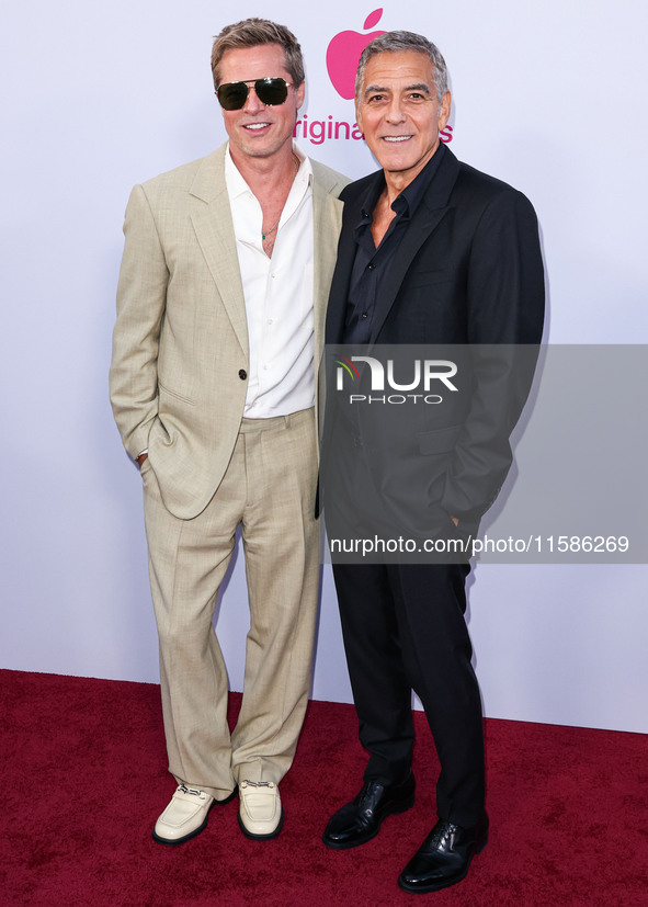 Brad Pitt and George Clooney arrive at the Los Angeles Premiere Of Apple TV+'s 'Wolfs' held at the TCL Chinese Theatre IMAX on September 18,...