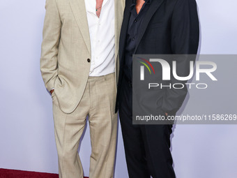 Brad Pitt and George Clooney arrive at the Los Angeles Premiere Of Apple TV+'s 'Wolfs' held at the TCL Chinese Theatre IMAX on September 18,...